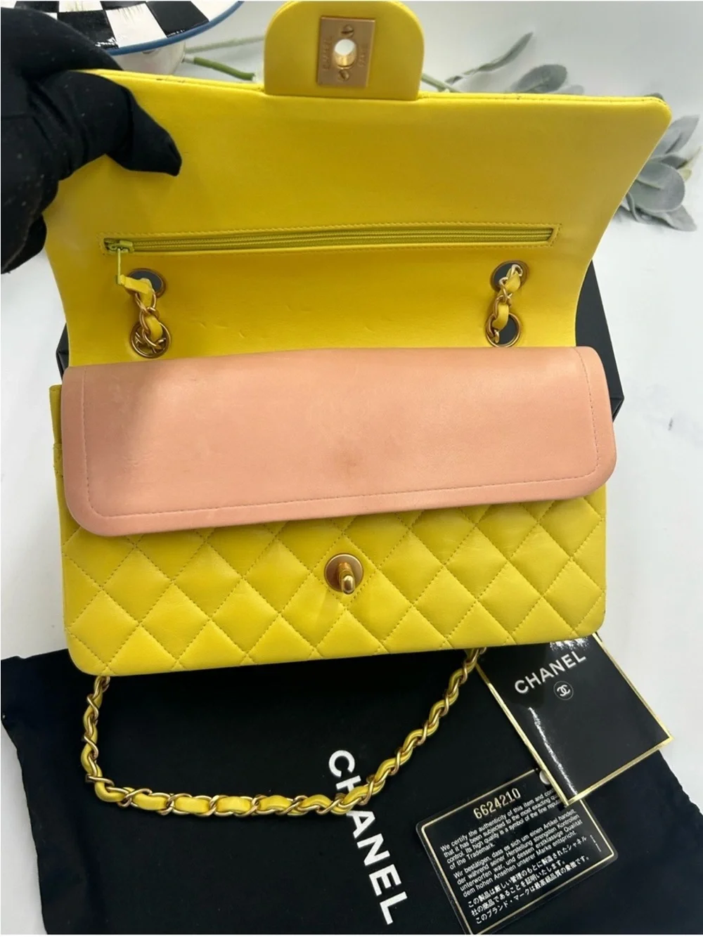 CHANEL CLASSIC QUILTED double flap bag . Yellow with gold hardware .